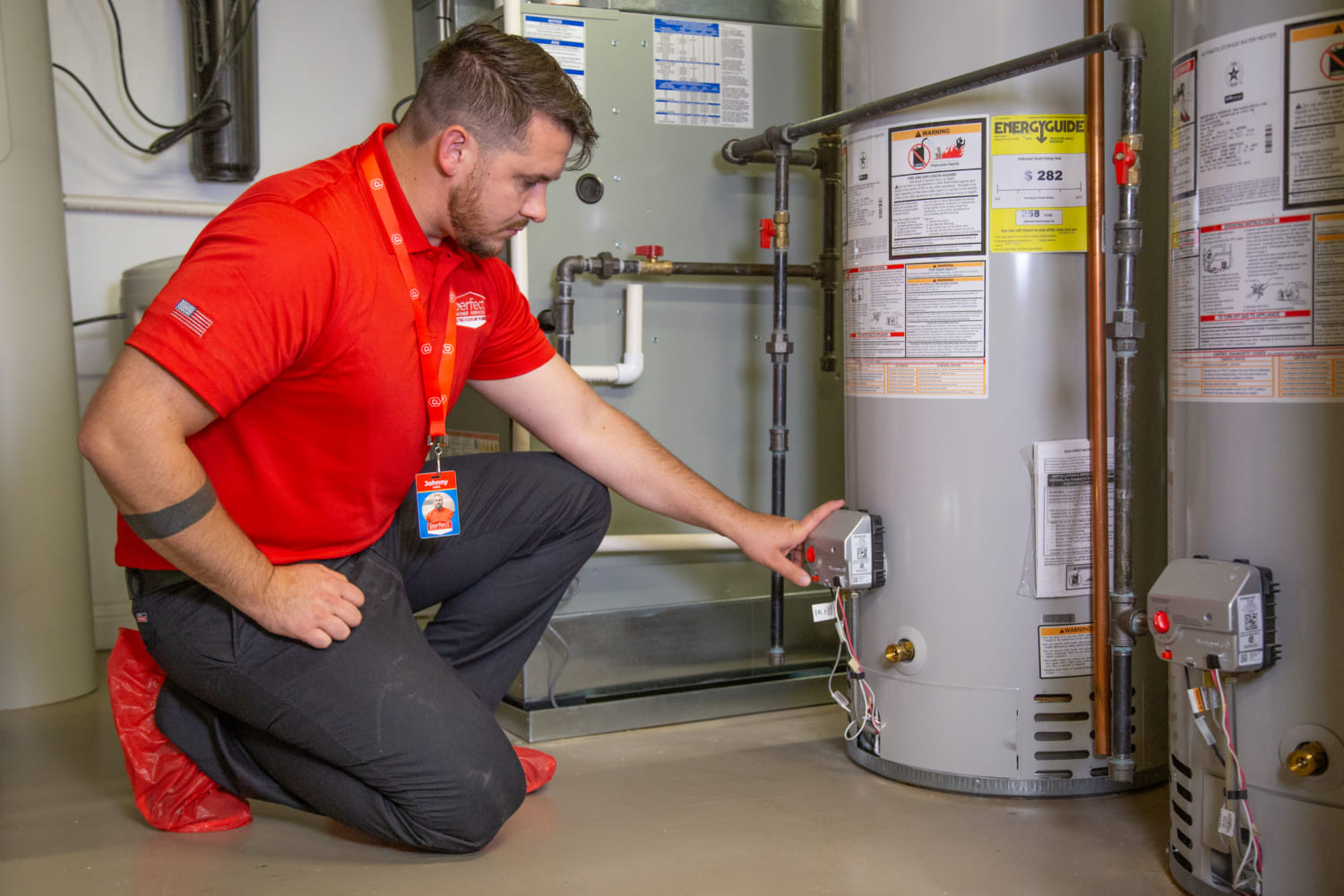 Perfect Home Services inspecting water heater